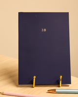 Personalised navy A5 lined notebook with gold foil lettering
