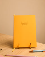 Personalised yellow A5 lined notebook with gold foil lettering